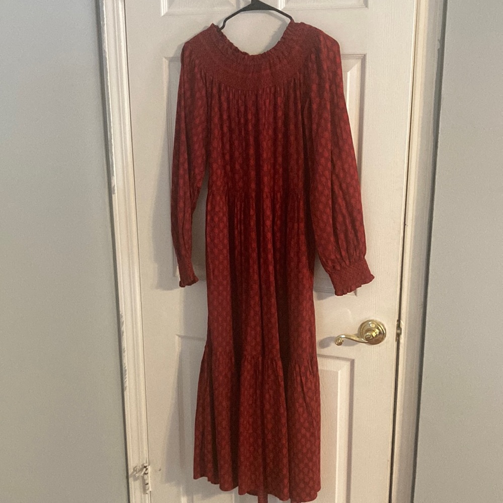 Size X-Small Universal Thread dress. The color is a beautiful crimson red.